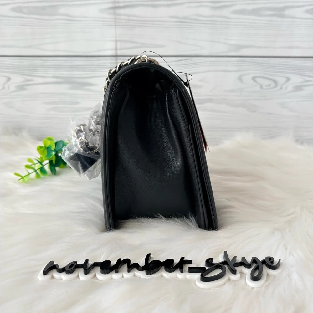 Badgley Mischka shoulder leather